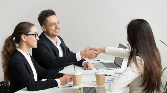 friendly-partners-handshaking-group-meeting-thanking-successful-teamwork.jpg