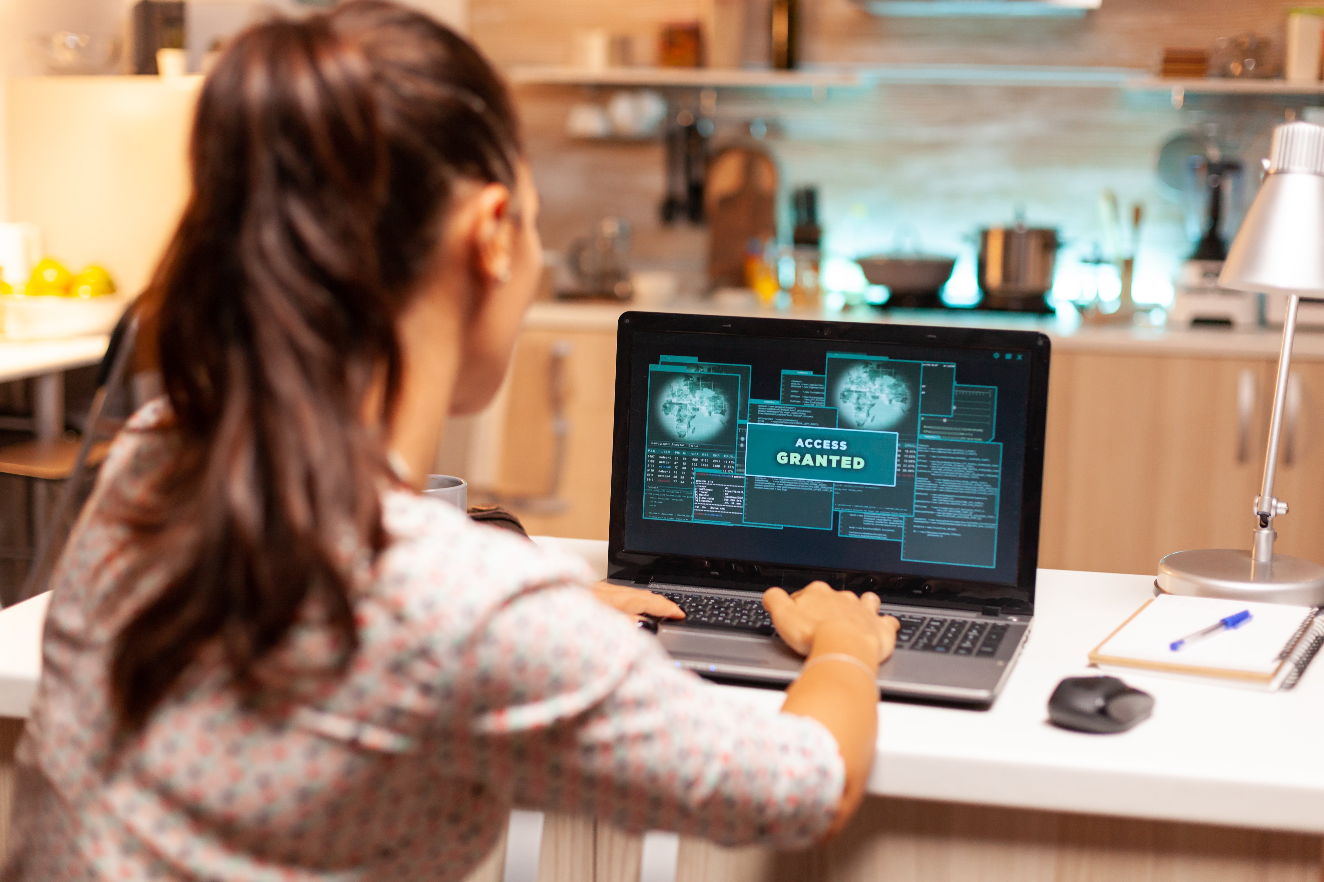 hacker-woman-launching-cyberattack-bank-firewall-from-home-night-time-programmer-writing-dangerous-malware-cyber-attacks-using-performance-laptop-midnight.jpg