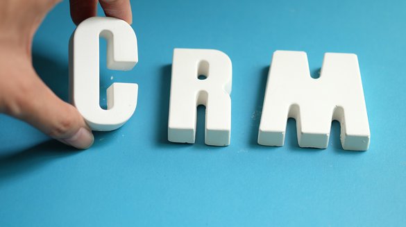 hand-arrange-white-letters-as-crm.jpg