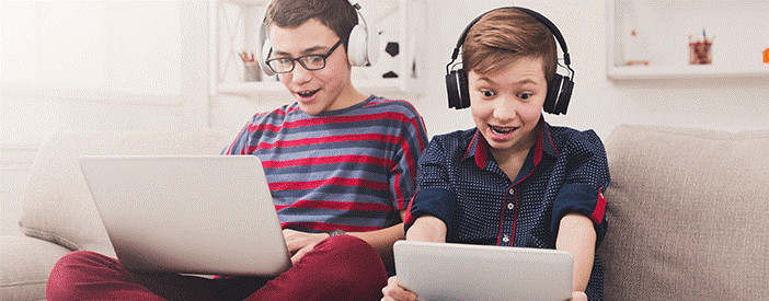 kids playing on laptop.png