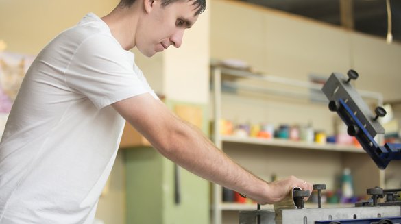 young-man-screen-printing.jpg