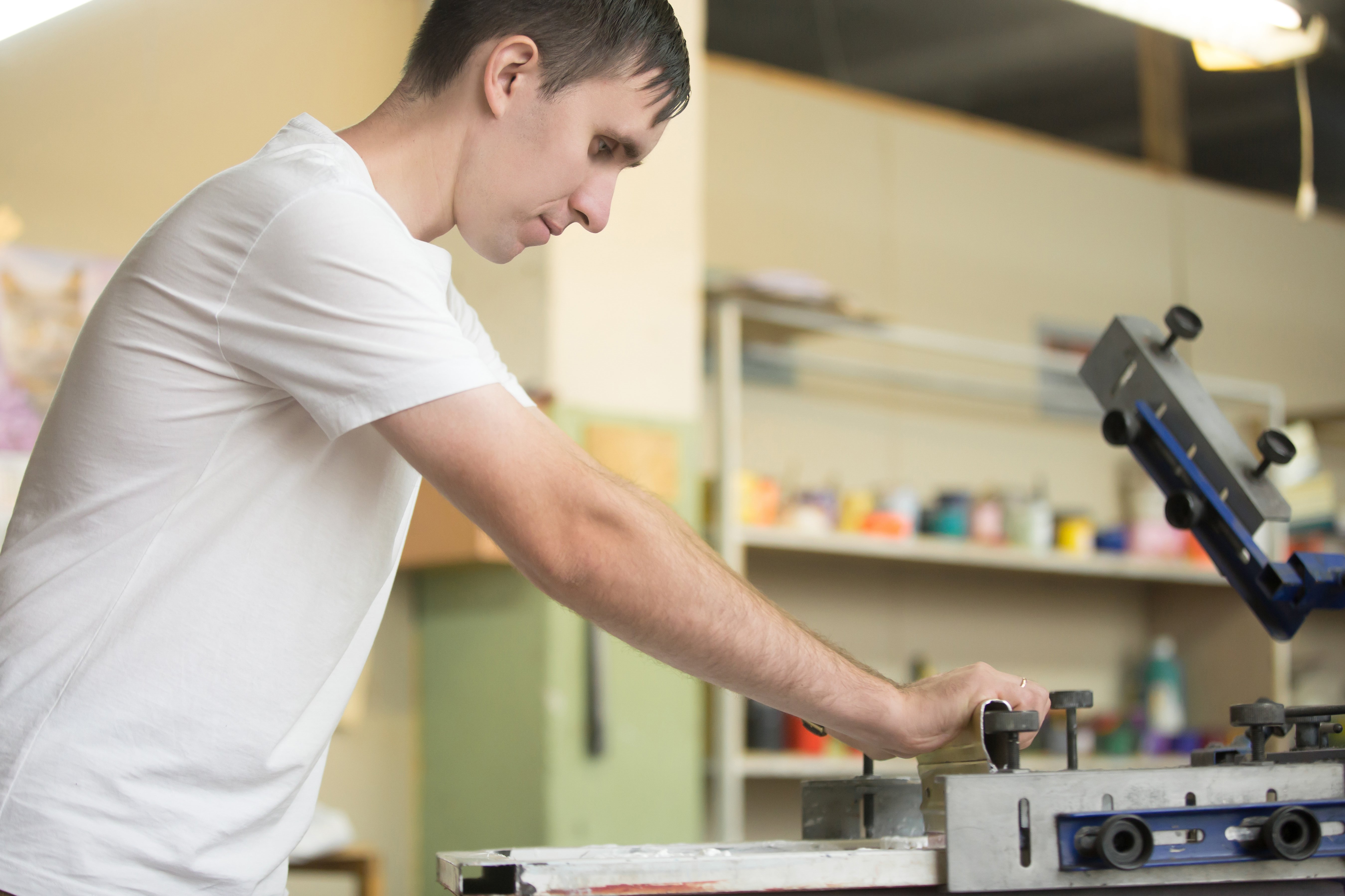 young-man-screen-printing.jpg